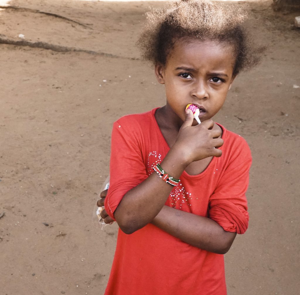 Lamu girl with candy